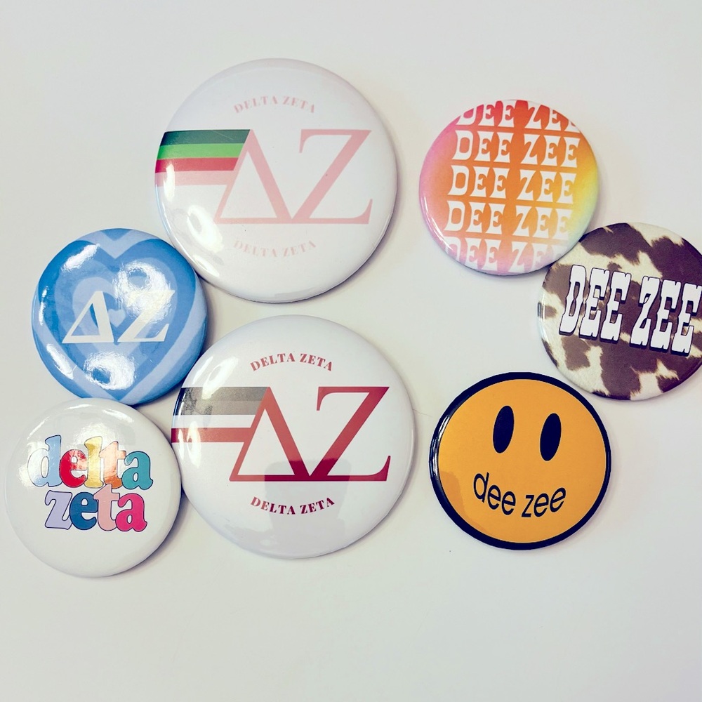Lot of 8 Dee Zee game day buttons New!